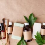 Eco-friendly and sustainable body care and skincare products such as bamboo toothbrush and natural bar soap.