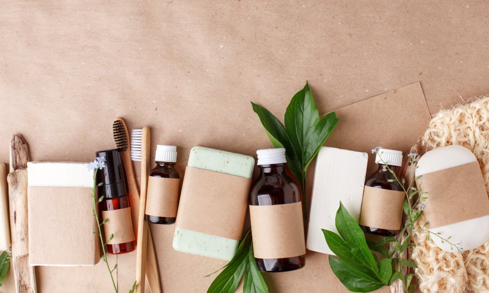 Eco-friendly and sustainable body care and skincare products such as bamboo toothbrush and natural bar soap.